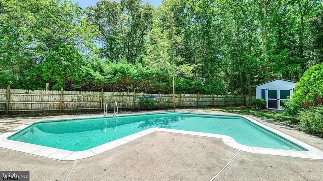 a house view with a seating space and garden
