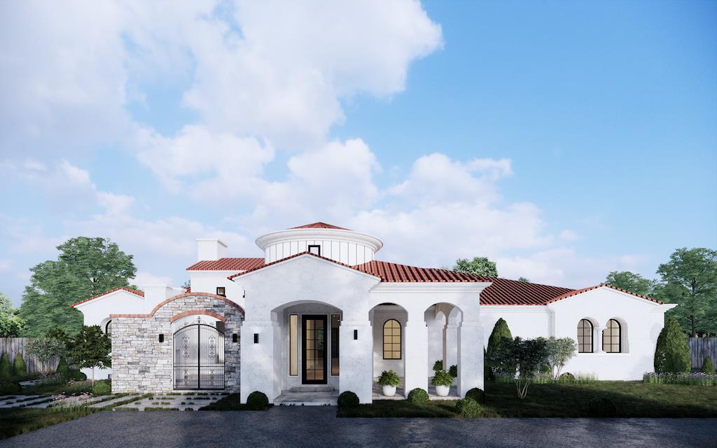 a white house with a yard and garage
