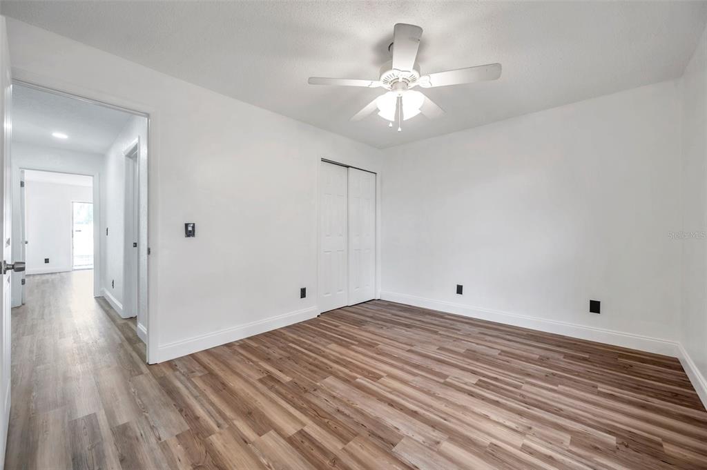 1520 Windmill Pointe Road Palm Harbor, FL 34685 - Photo 29 of 64 a view of a room with wooden floor