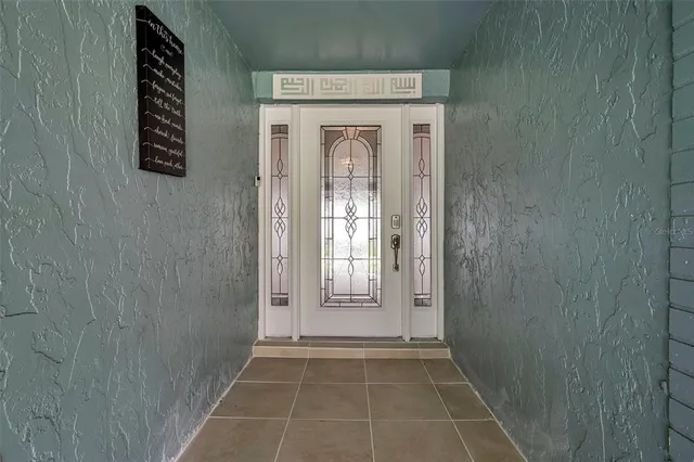 a view of a kitchen and dining room