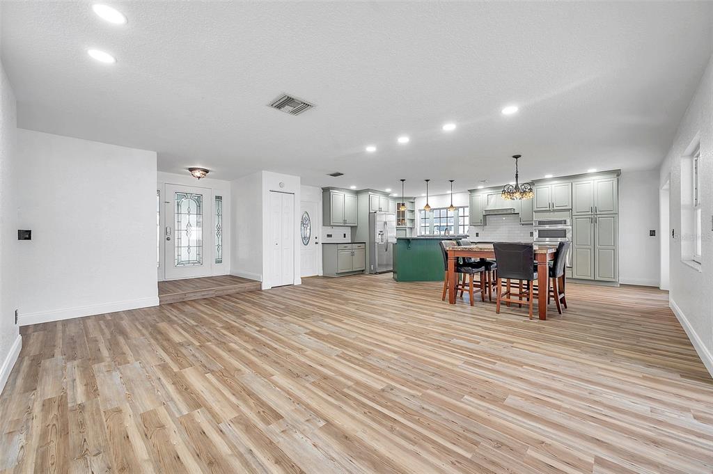 1520 Windmill Pointe Road Palm Harbor, FL 34685 - Photo 10 of 64 a view of a kitchen and dining room