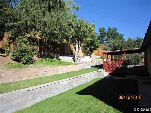 3908 Kings Row Reno, NV 89503 - Photo 8 of 8 a view of a bench in the garden