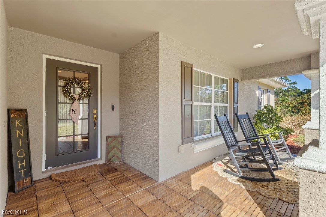 3610 65th Street West Lehigh Acres, FL 33971 - Photo 4 of 33 a view of a dining room with furniture window and outside view