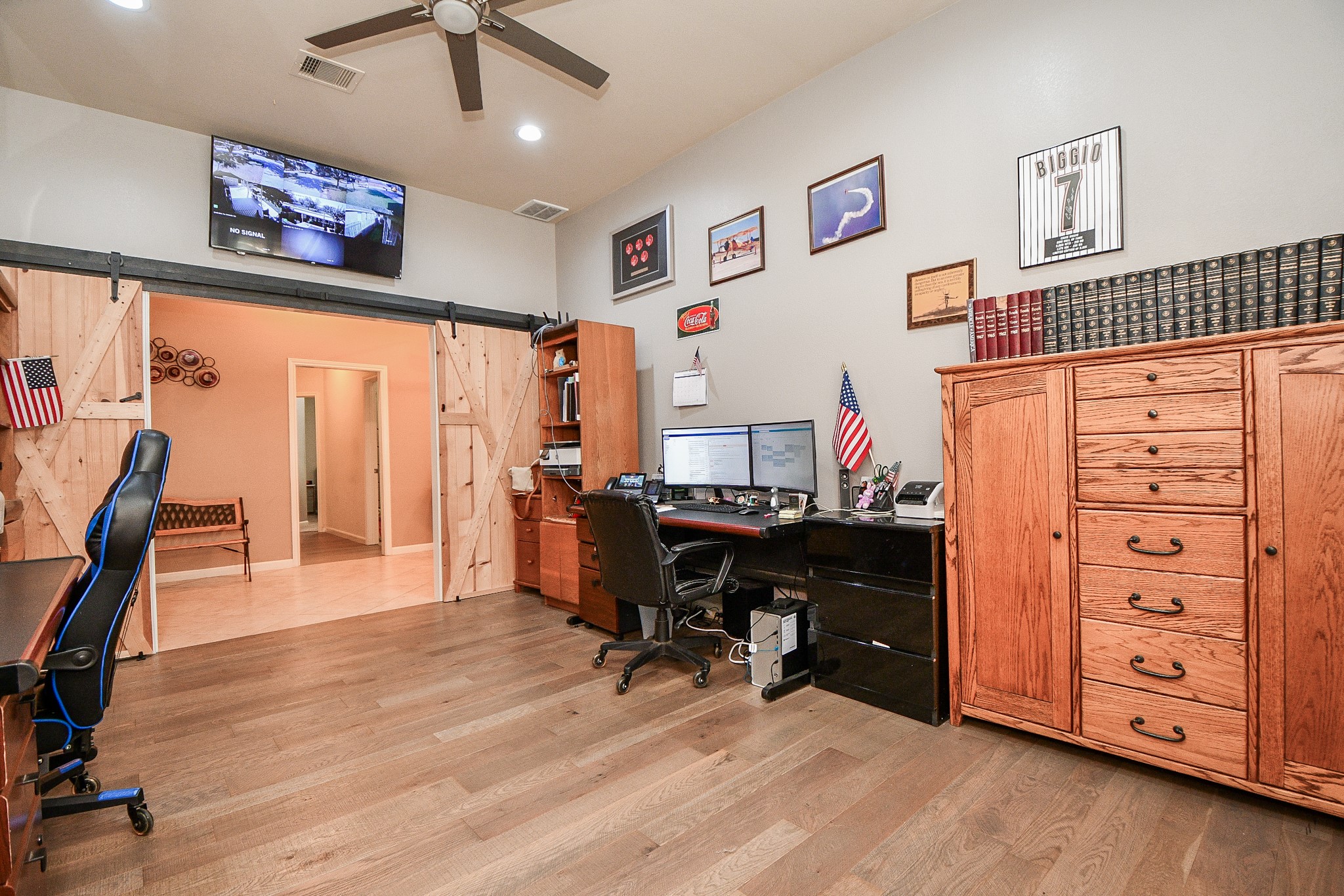 5324 Troutline Lane Rosenberg, TX 77471 - Photo 19 of 30 a view of a workspace with furniture and a ceiling fan