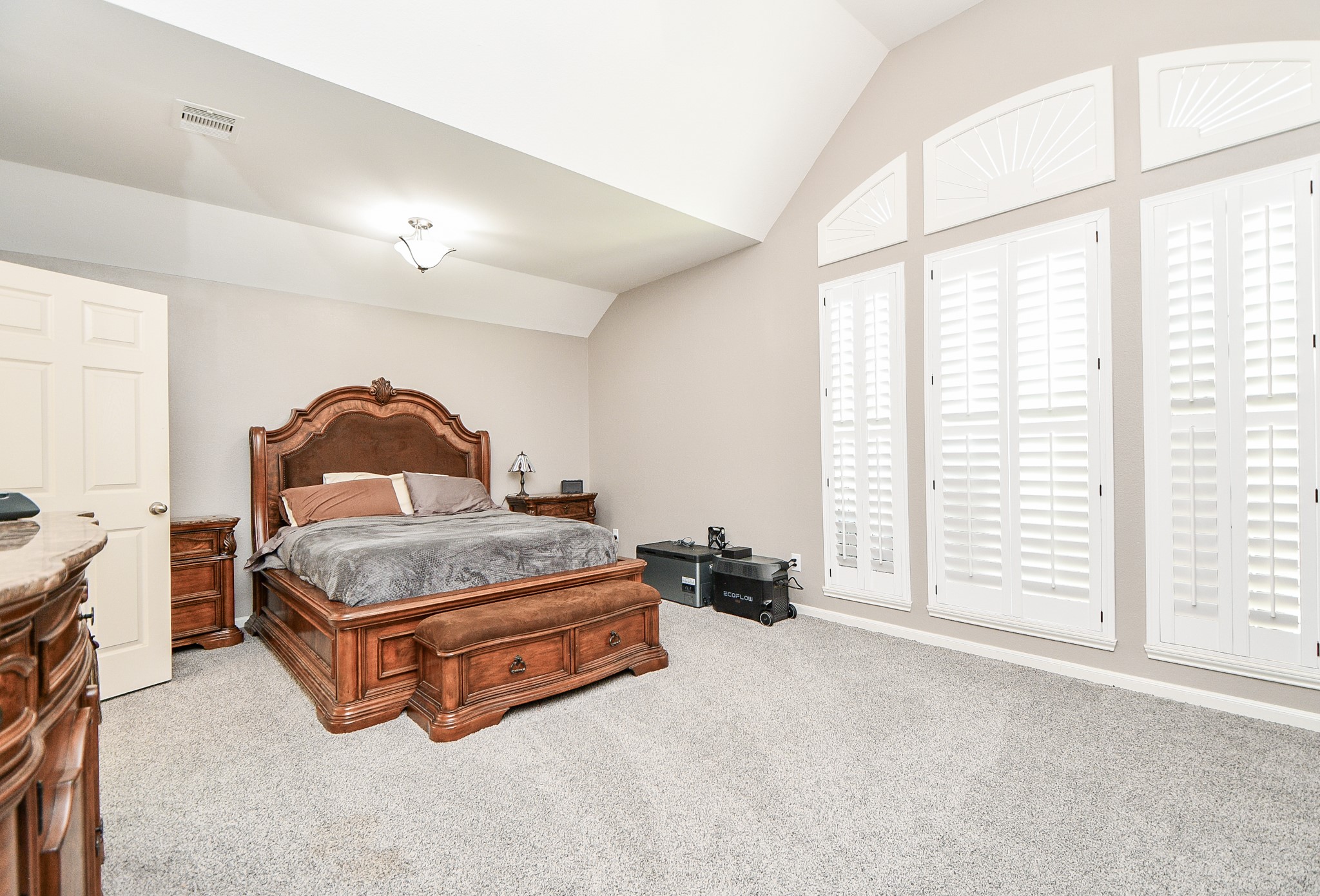 5324 Troutline Lane Rosenberg, TX 77471 - Photo 20 of 30 a spacious bedroom with a bed and a window
