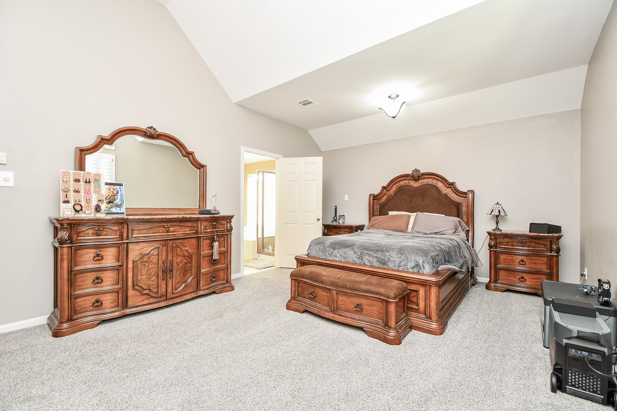 5324 Troutline Lane Rosenberg, TX 77471 - Photo 21 of 30 a bedroom with a bed and dresser