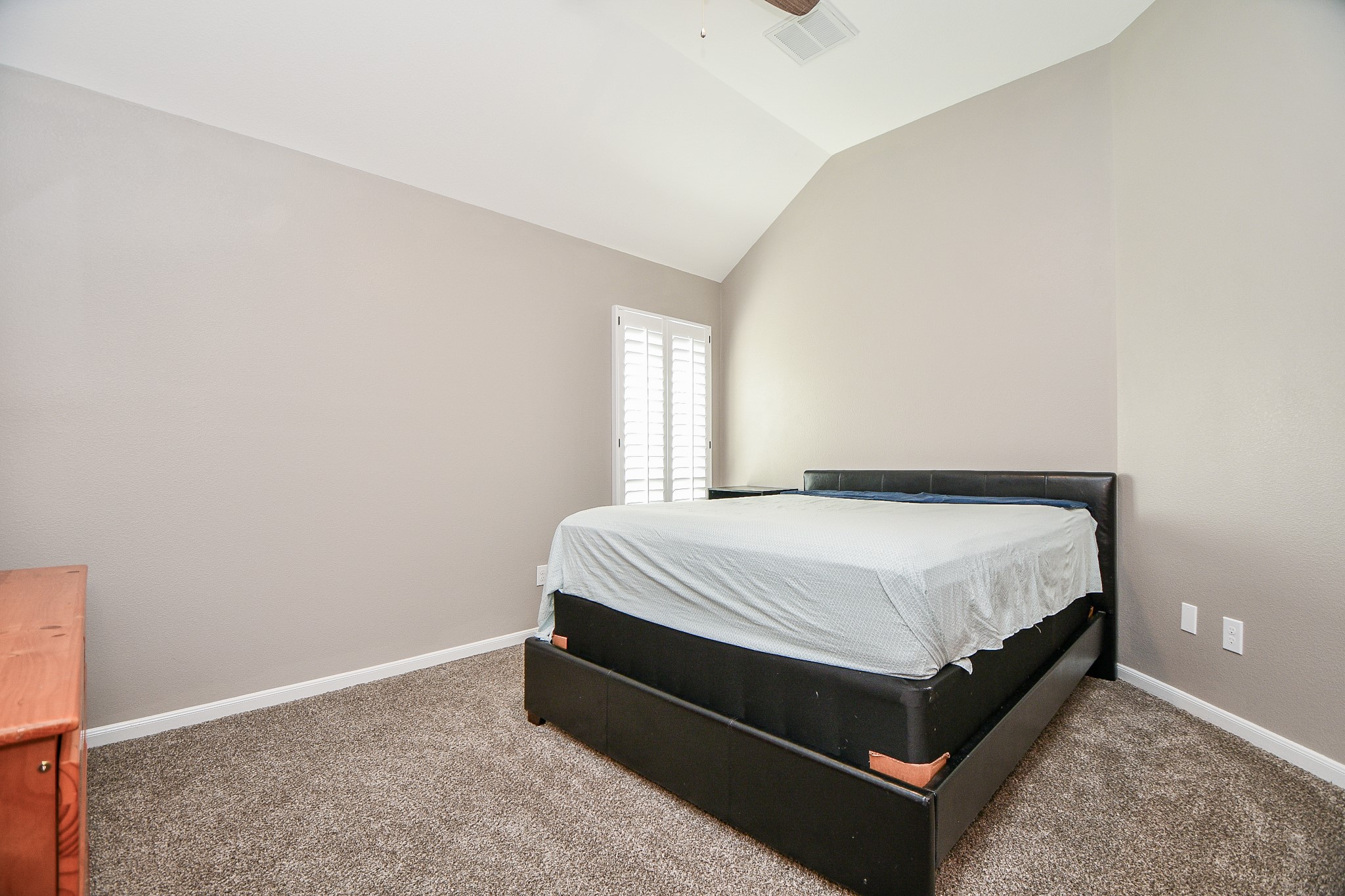 5324 Troutline Lane Rosenberg, TX 77471 - Photo 23 of 30 a bed sitting in a spacious bedroom next to a window