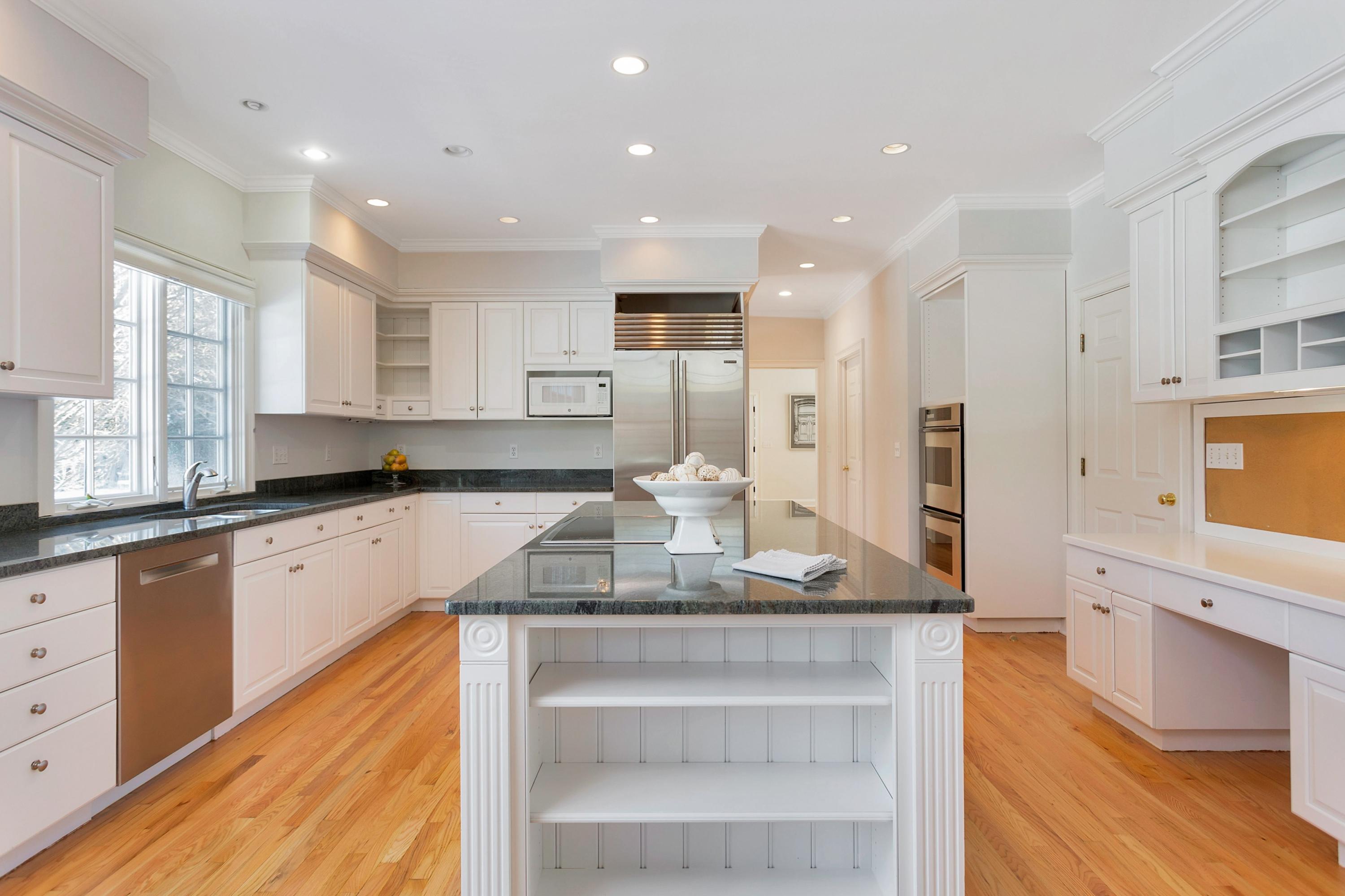 244 Hollow Tree Ridge Road Darien, CT 06820 - Photo 17 of 38 a large kitchen with granite countertop lots of counter top space