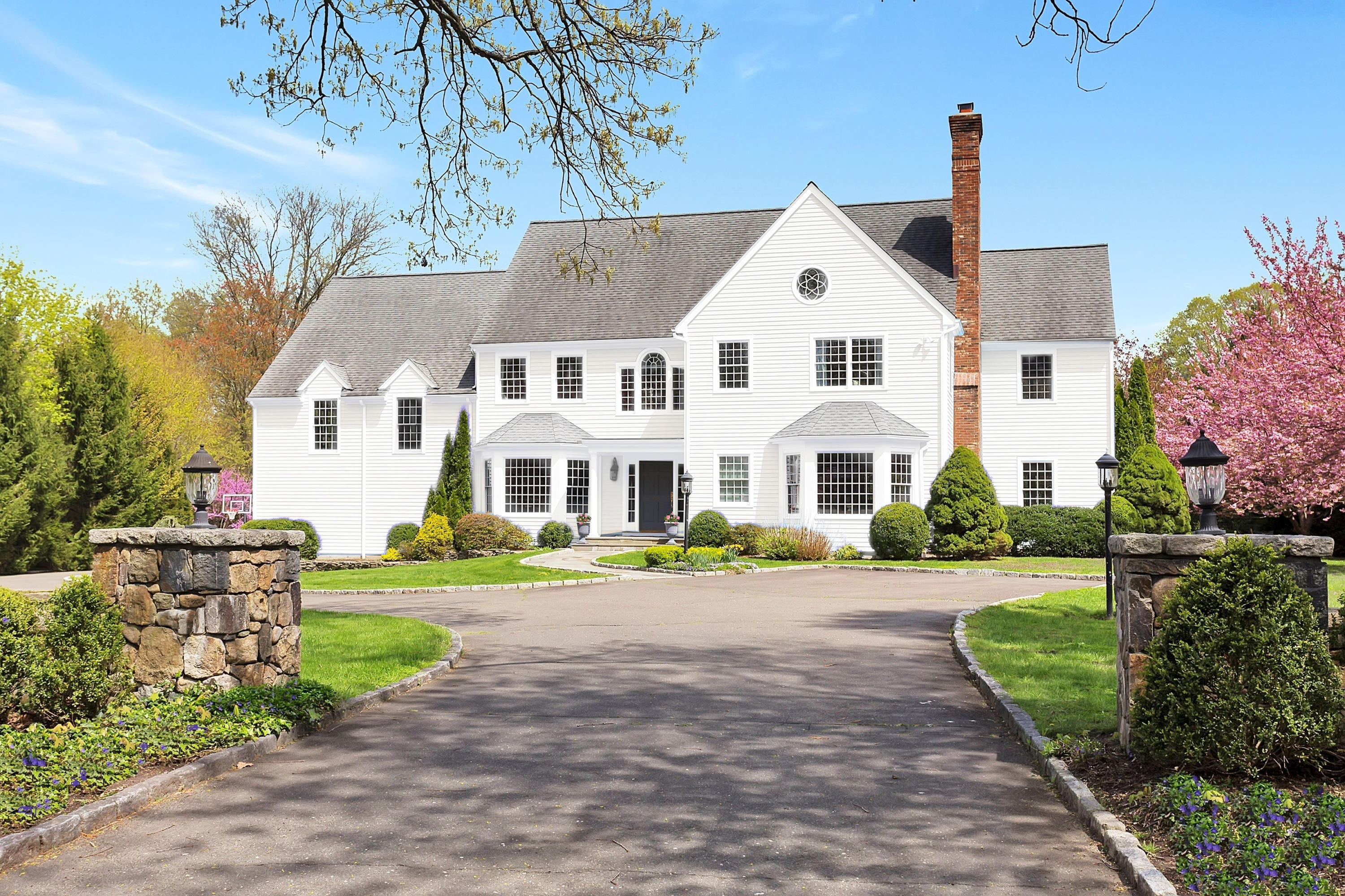 244 Hollow Tree Ridge Road Darien, CT 06820 - Photo 3 of 38 a view of a house with a yard