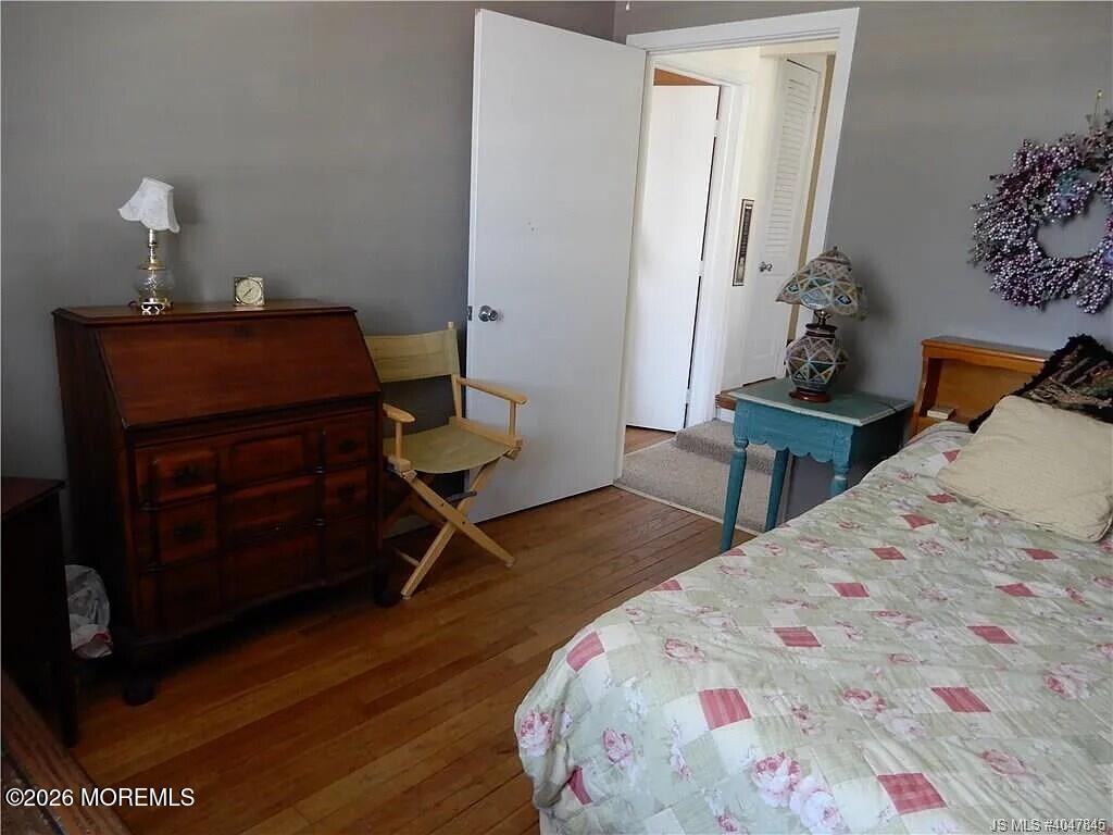 367 North Main Street Barnegat, NJ 08005 - Photo 3 of 12 a bedroom with a bed and a dresser