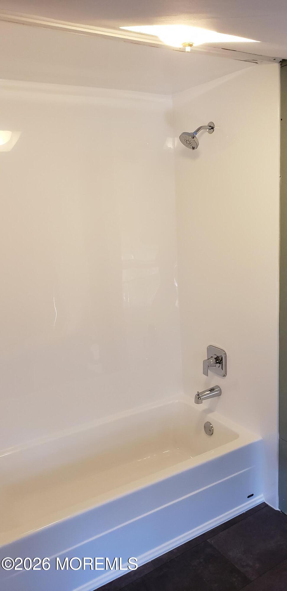 367 North Main Street Barnegat, NJ 08005 - Photo 5 of 12 a bathroom with a bathtub and a shower