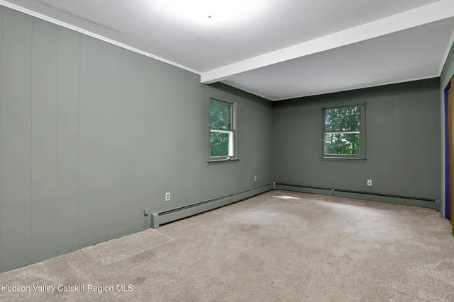 an empty room with windows