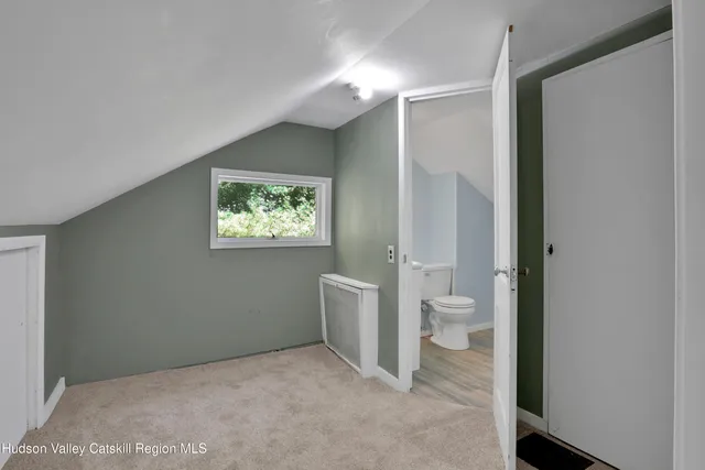 a bathroom with a toilet sink and a bathtub