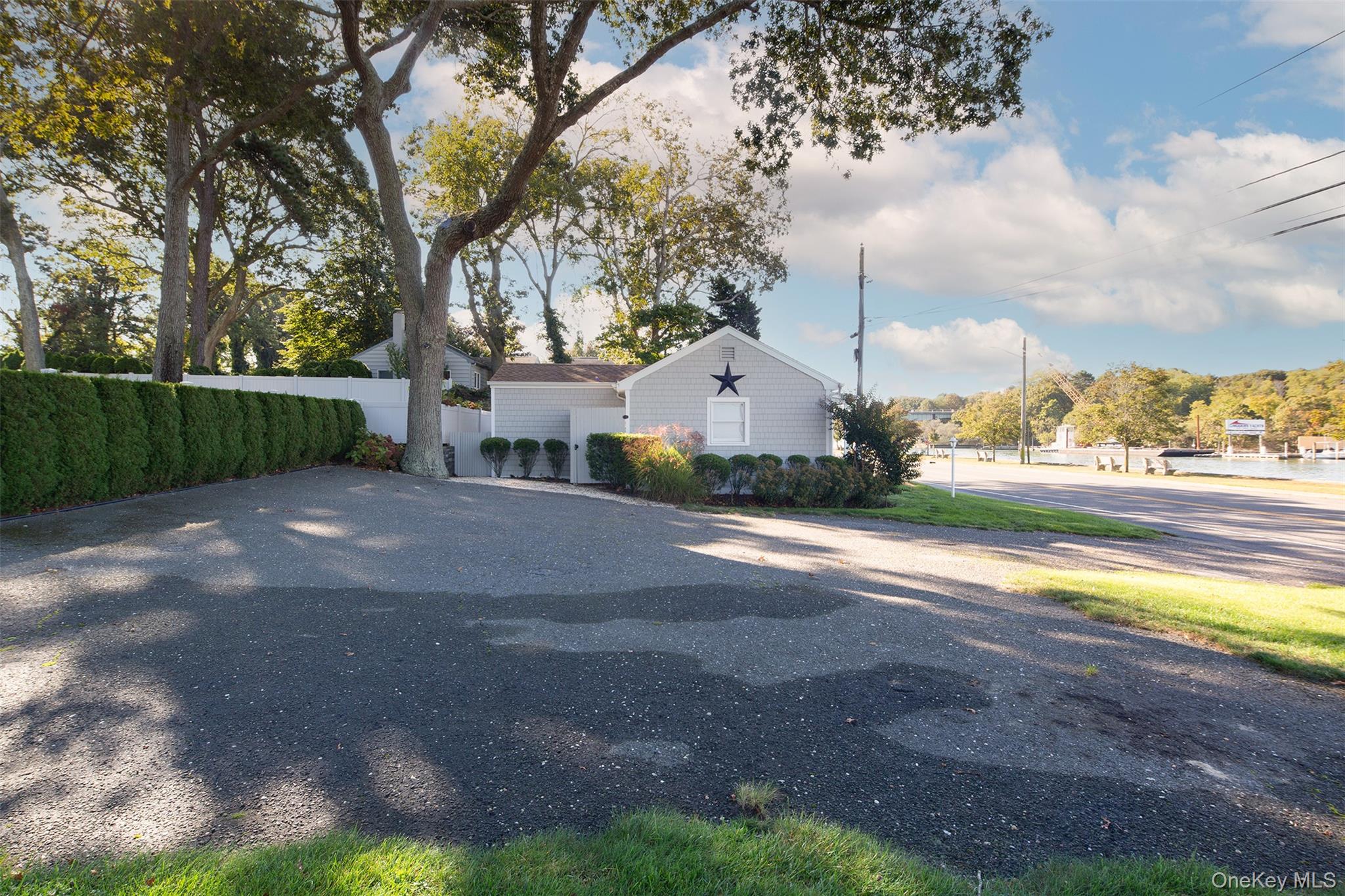 1 Canal Road Hampton Bays, NY 11946 - Photo 36 of 50 View of side of property