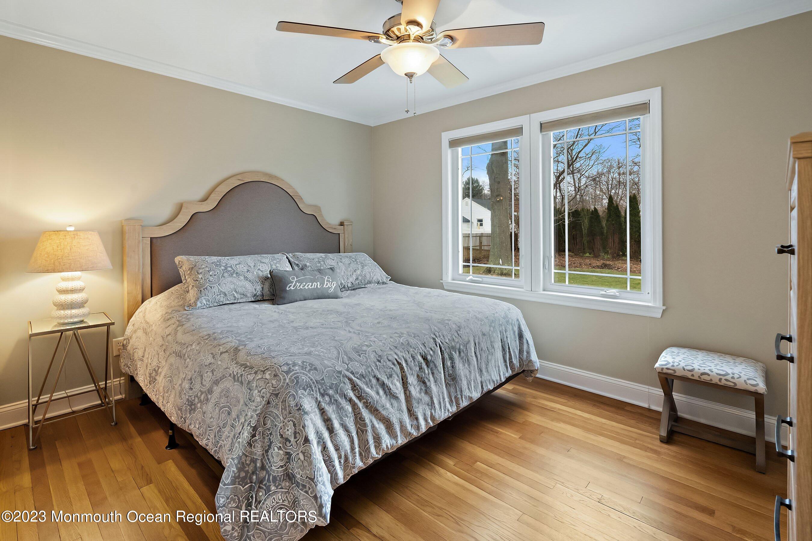 554 Hopping Road Belford, NJ 07718 - Photo 14 of 26 a bedroom with a bed and a window