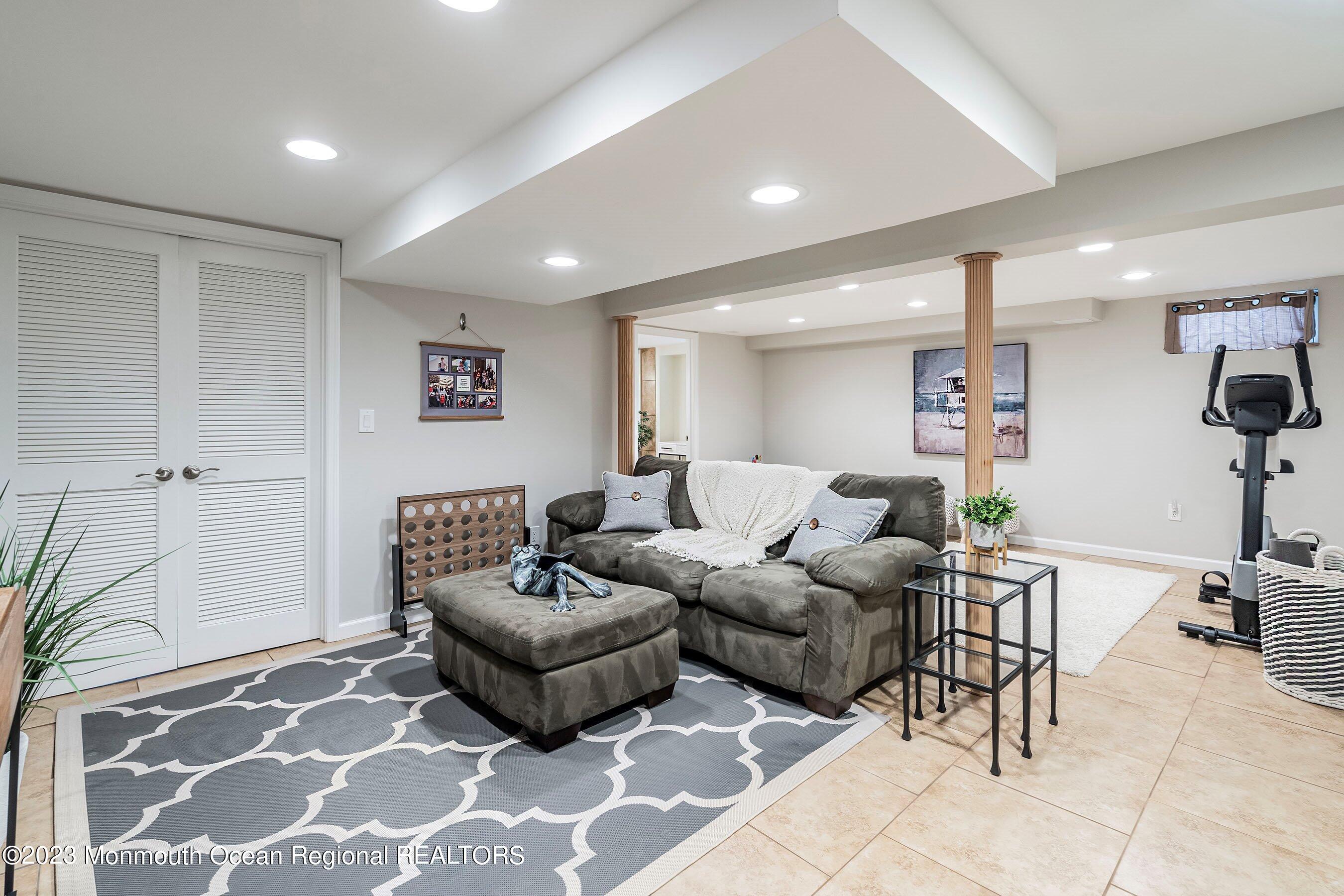 554 Hopping Road Belford, NJ 07718 - Photo 18 of 26 a living room with furniture and wooden floor