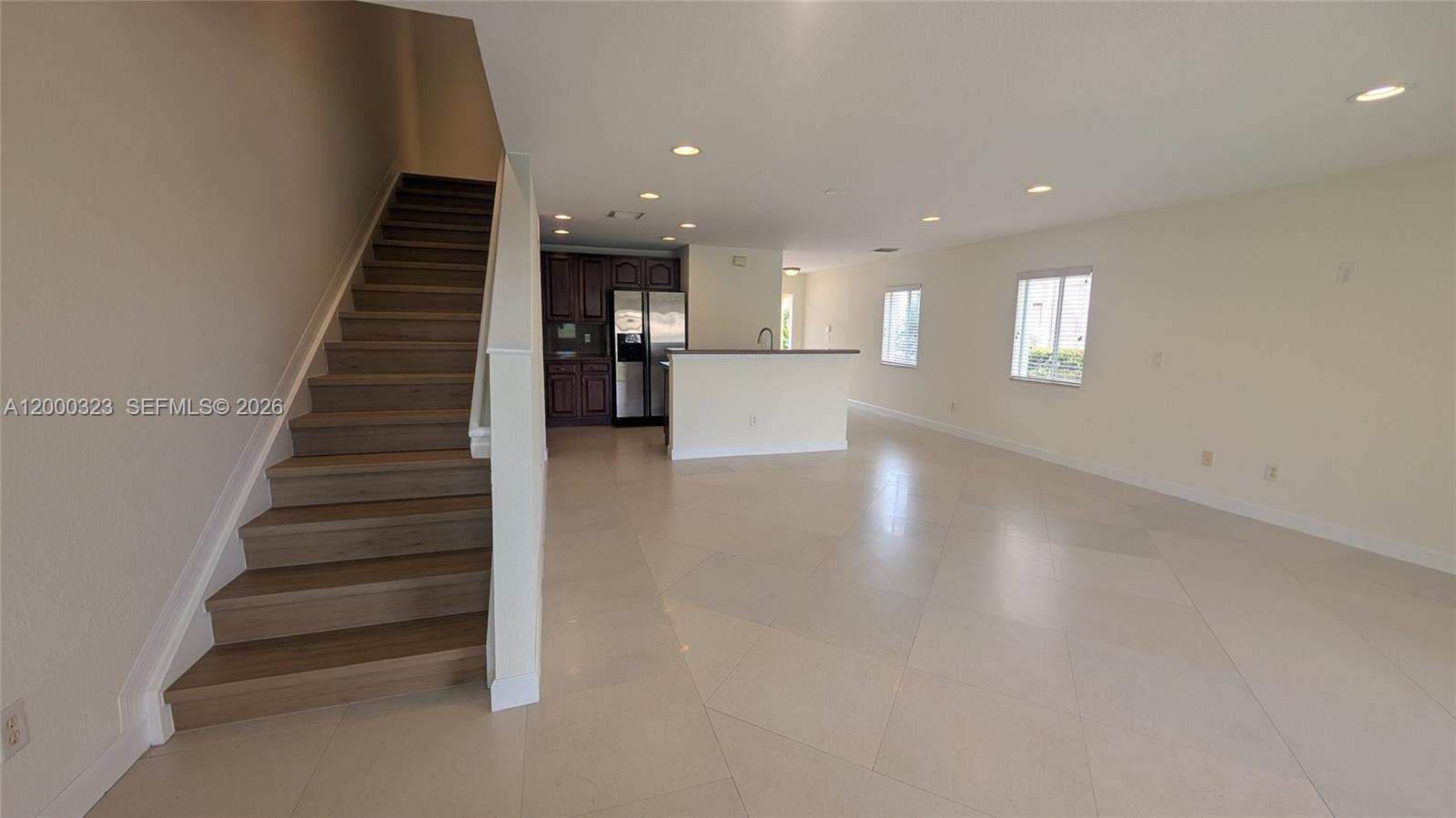 5910 Royal Way Tamarac, FL 33321 - Photo 20 of 36 a view of entryway and hall with wooden floor