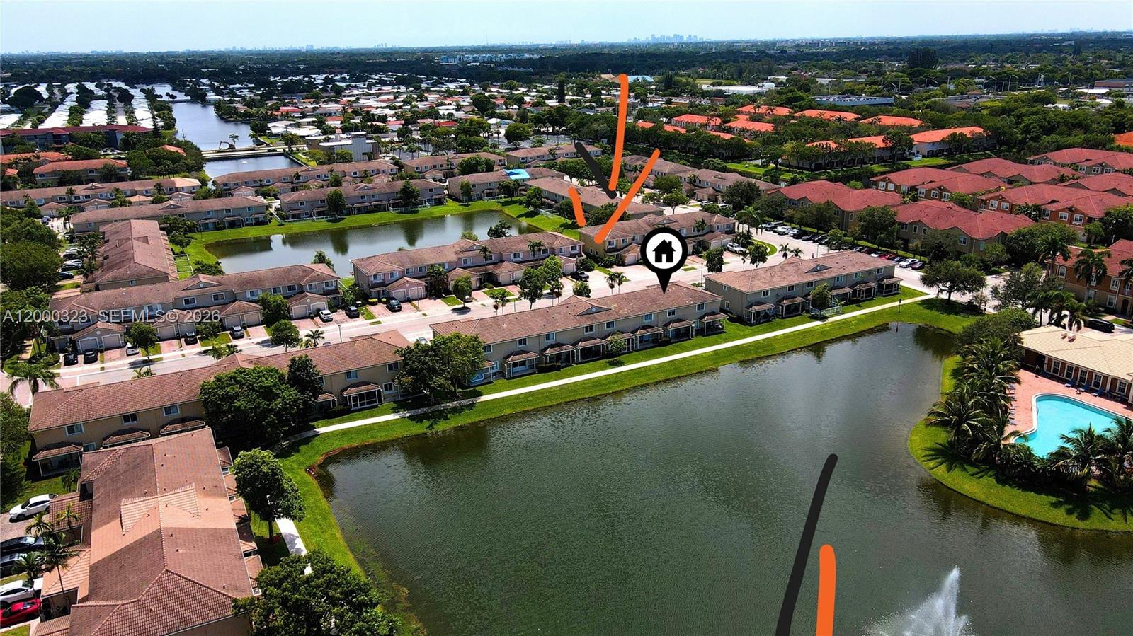 5910 Royal Way Tamarac, FL 33321 - Photo 30 of 36 an aerial view of lake and residential houses with outdoor space