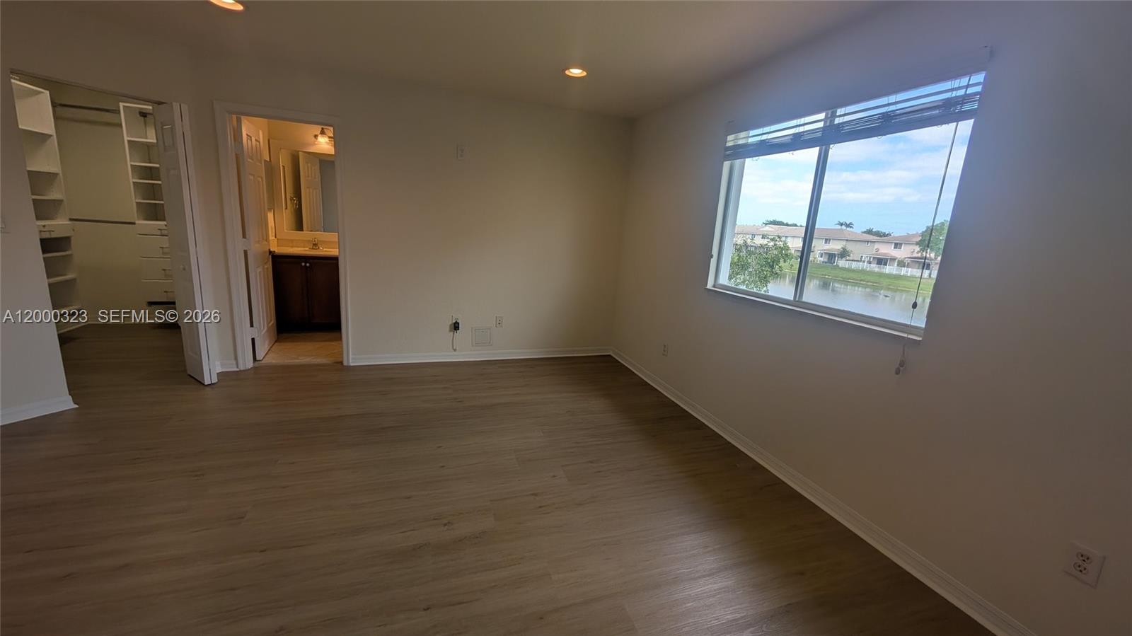 5910 Royal Way Tamarac, FL 33321 - Photo 5 of 36 an empty room with windows