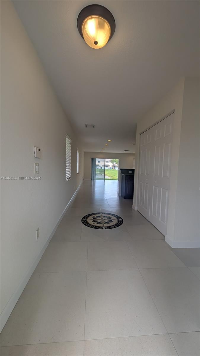 5910 Royal Way Tamarac, FL 33321 - Photo 10 of 36 a view of a livingroom and a kitchen