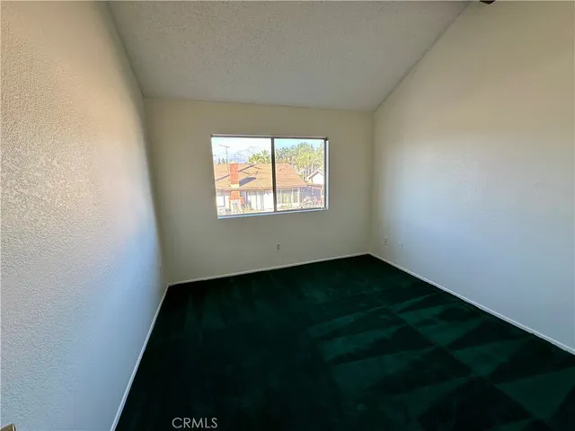 a kitchen with a sink and a microwave oven