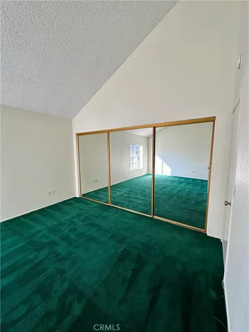 a bathroom with double vanity sink and a mirror