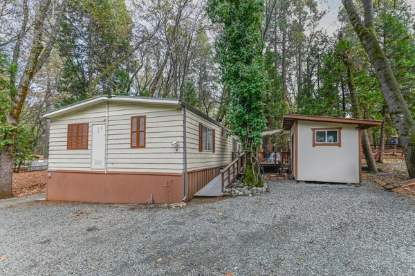 a house with trees in front of it
