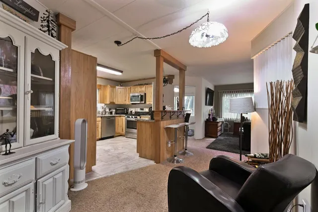 a kitchen with a stove and cabinets