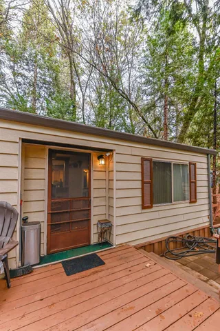 a living room with furniture window and wooden floor