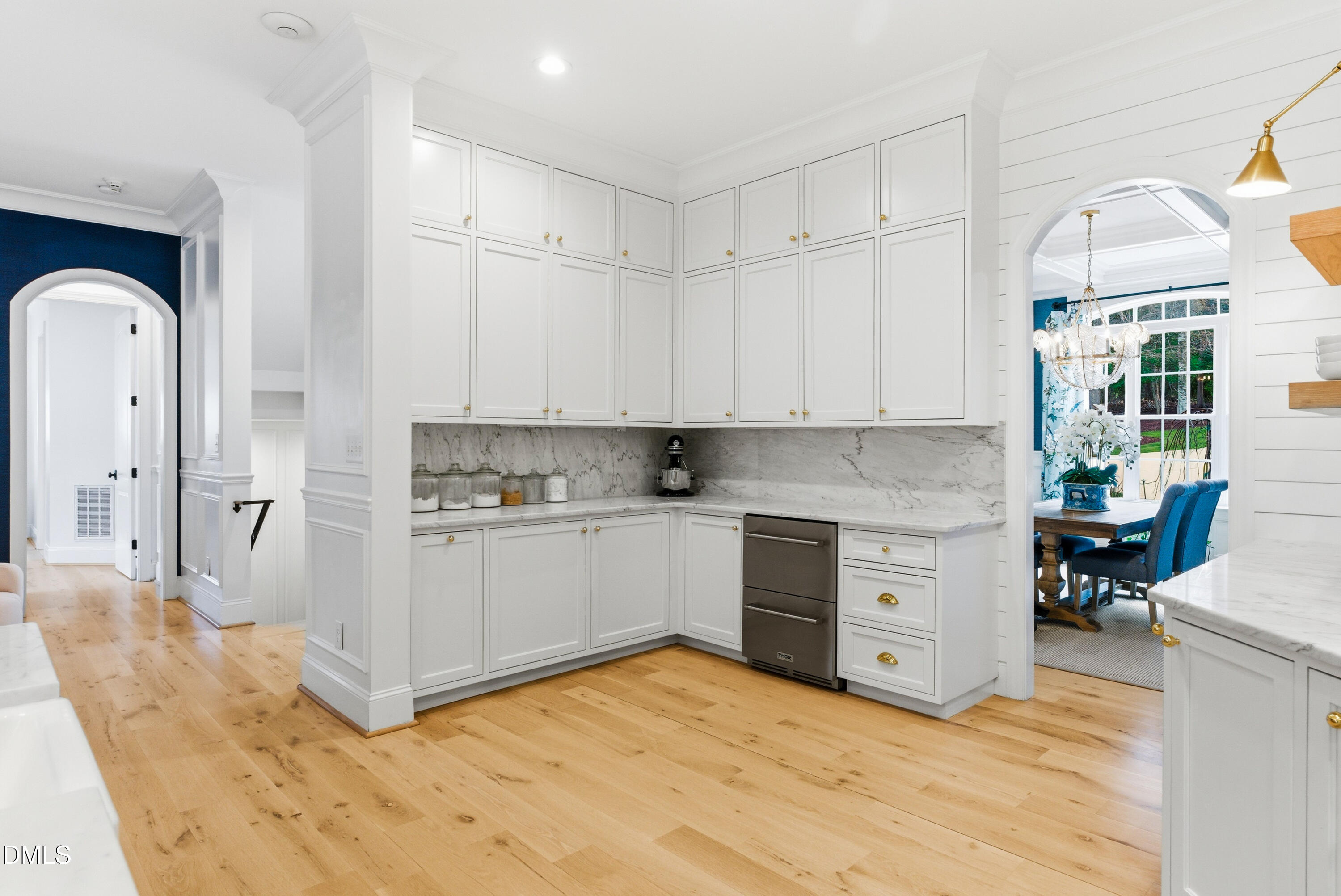 1528 Eglantyne Court Raleigh, NC 27613 - Photo 12 of 99 a kitchen with stainless steel appliances granite countertop a stove a sink and a refrigerator