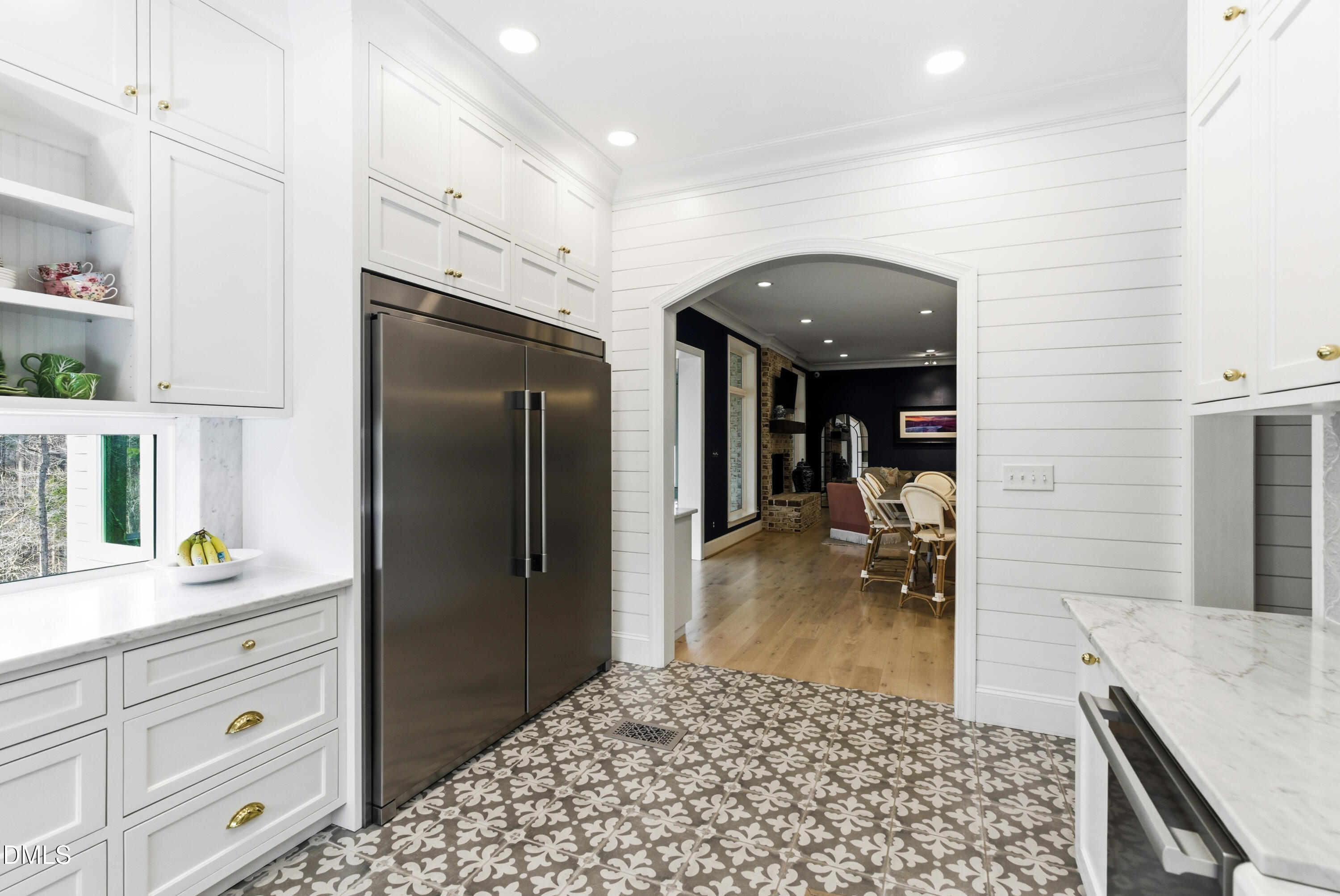 1528 Eglantyne Court Raleigh, NC 27613 - Photo 17 of 99 a kitchen with granite countertop a refrigerator and a sink