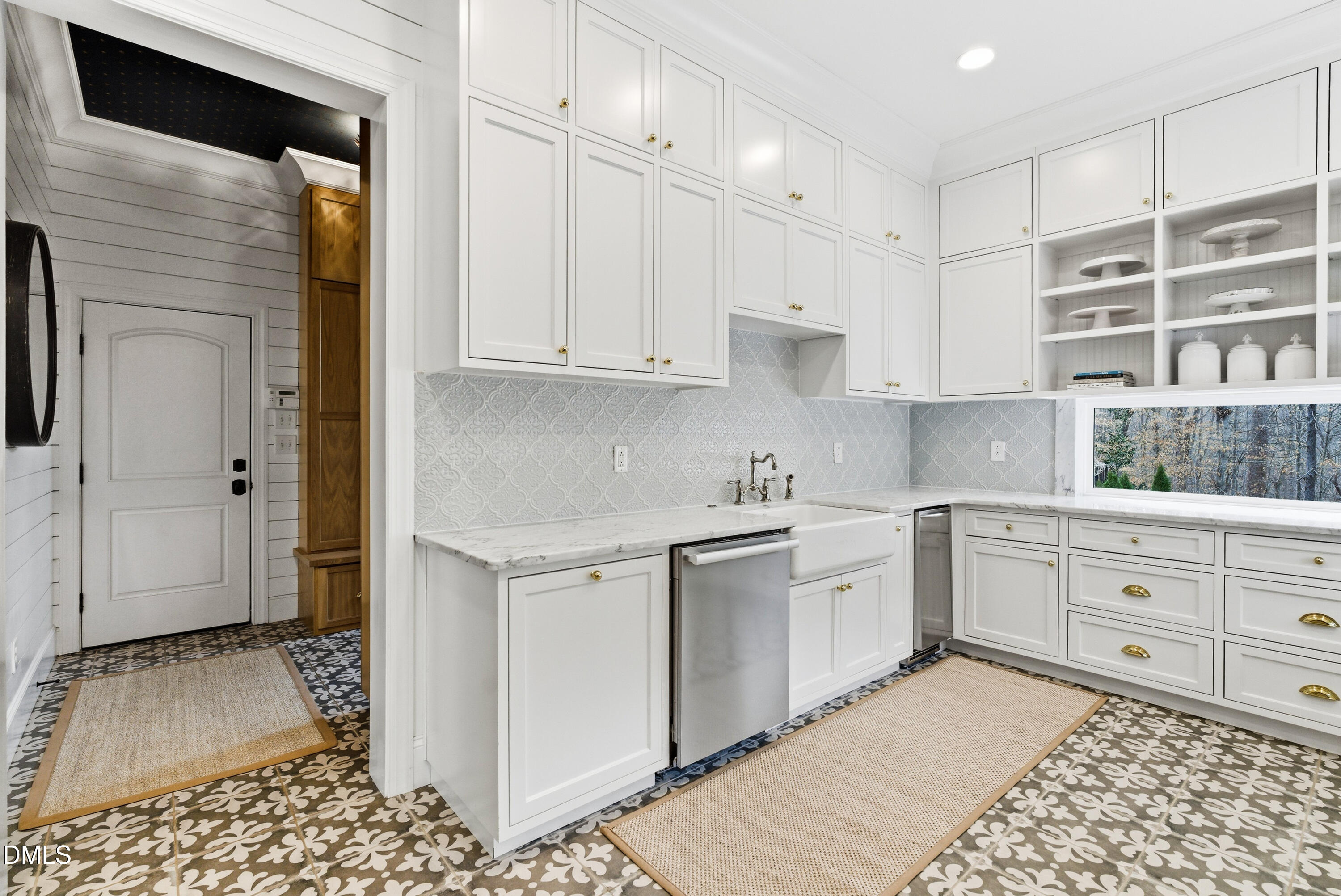 1528 Eglantyne Court Raleigh, NC 27613 - Photo 18 of 99 a kitchen with a stove a sink and a refrigerator