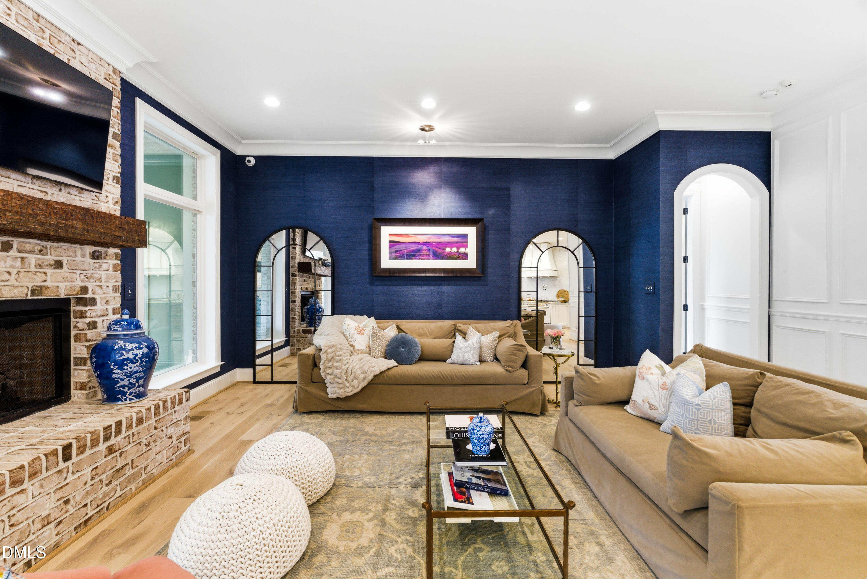 1528 Eglantyne Court Raleigh, NC 27613 - Photo 22 of 99 a living room with furniture fireplace and flat screen tv