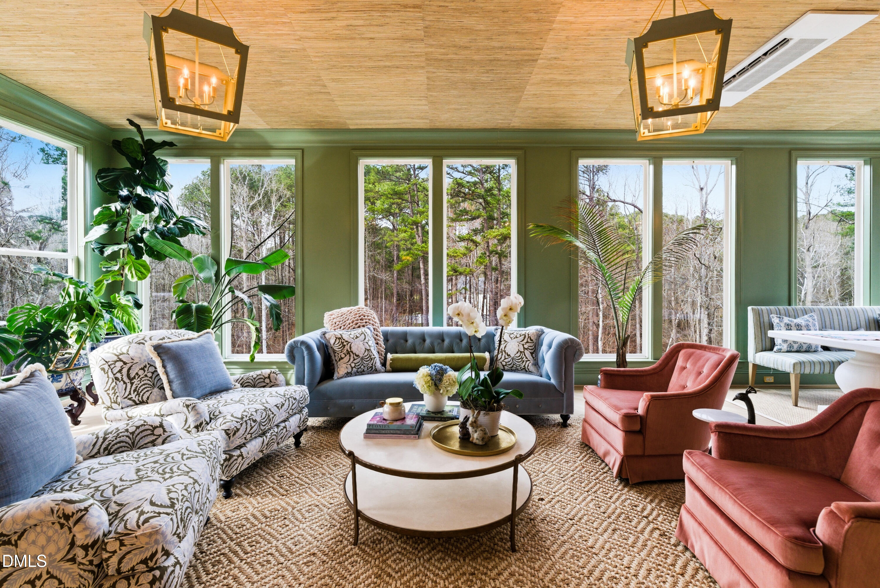 1528 Eglantyne Court Raleigh, NC 27613 - Photo 24 of 99 a living room with furniture and a large window