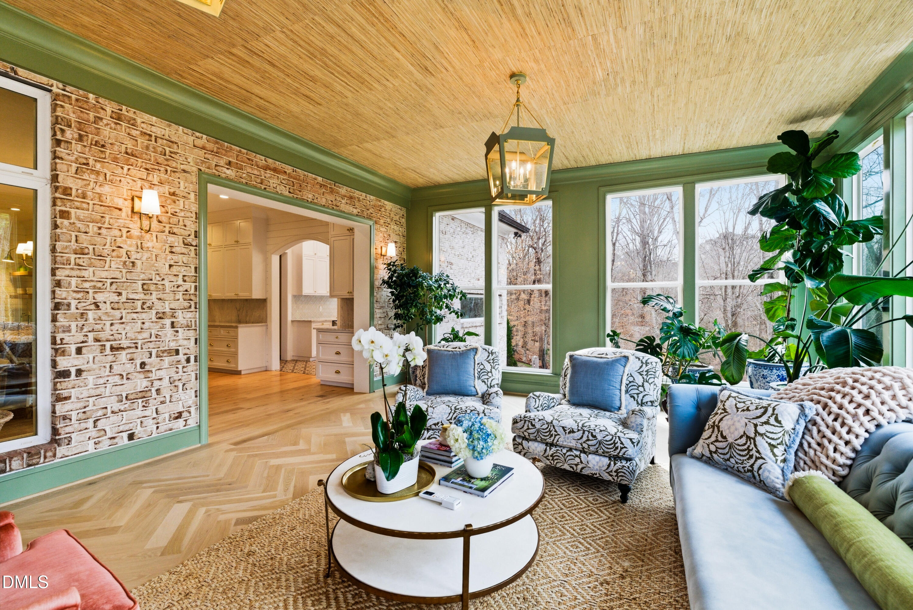 1528 Eglantyne Court Raleigh, NC 27613 - Photo 26 of 99 a living room with furniture and a large window