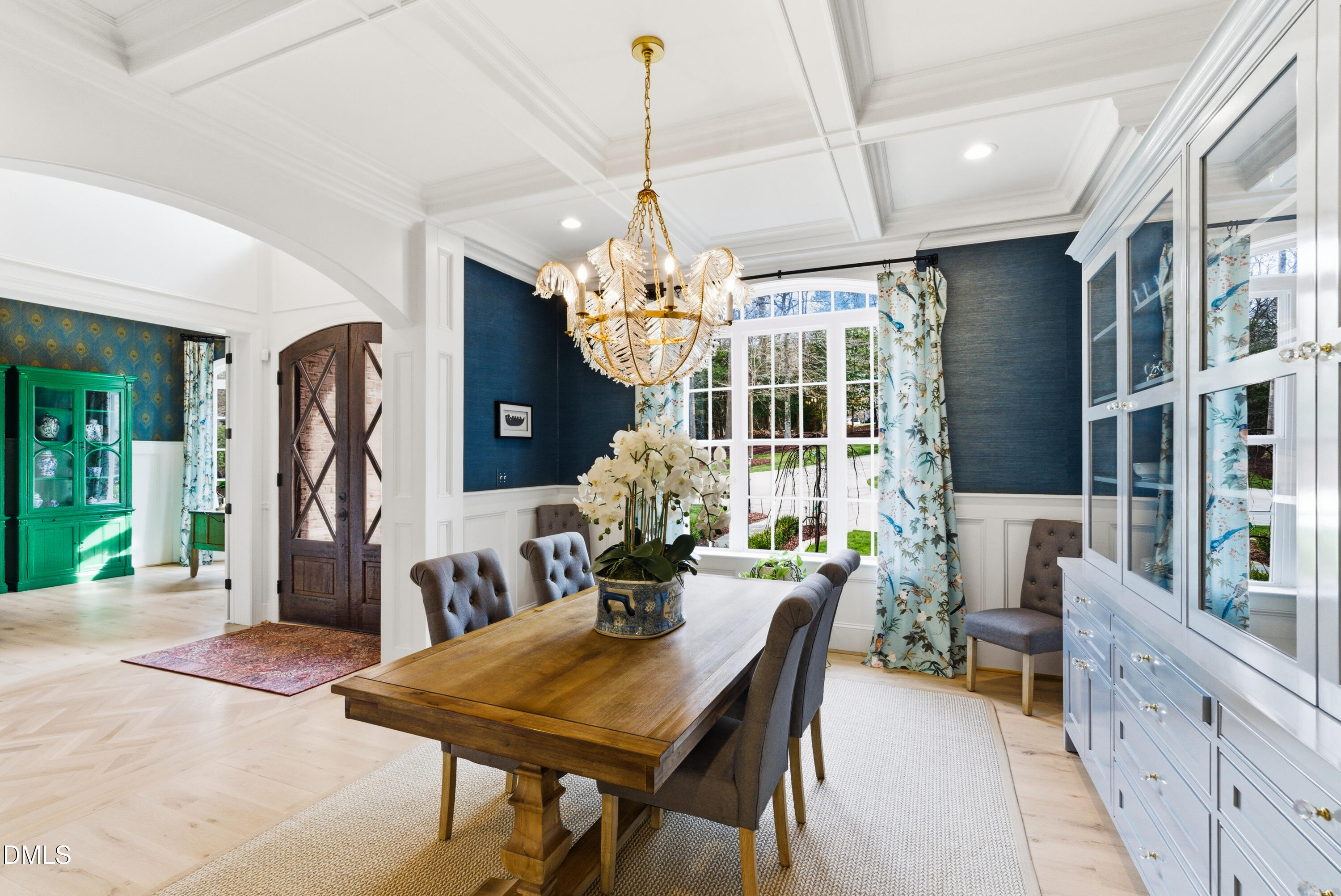 1528 Eglantyne Court Raleigh, NC 27613 - Photo 4 of 99 a view of a dining room with furniture chandelier and wooden floor