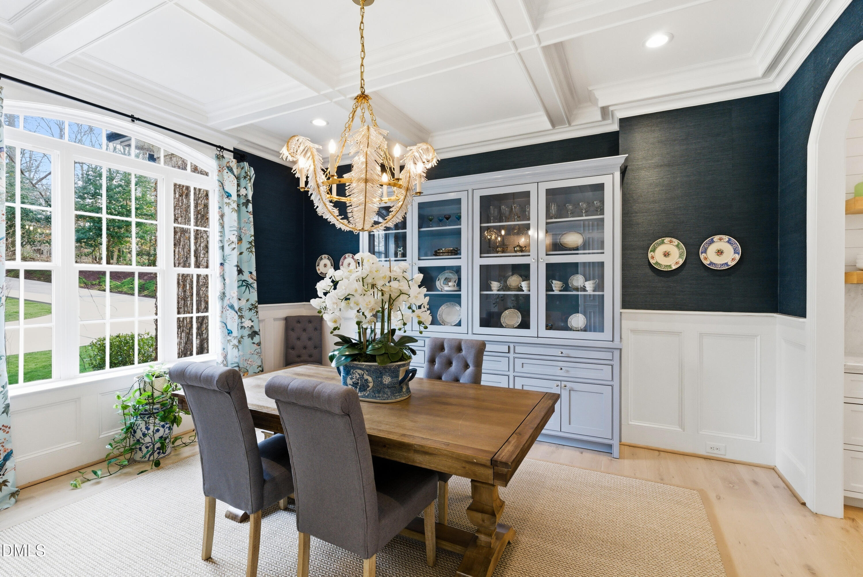 1528 Eglantyne Court Raleigh, NC 27613 - Photo 5 of 99 a dining room with furniture a chandelier and window