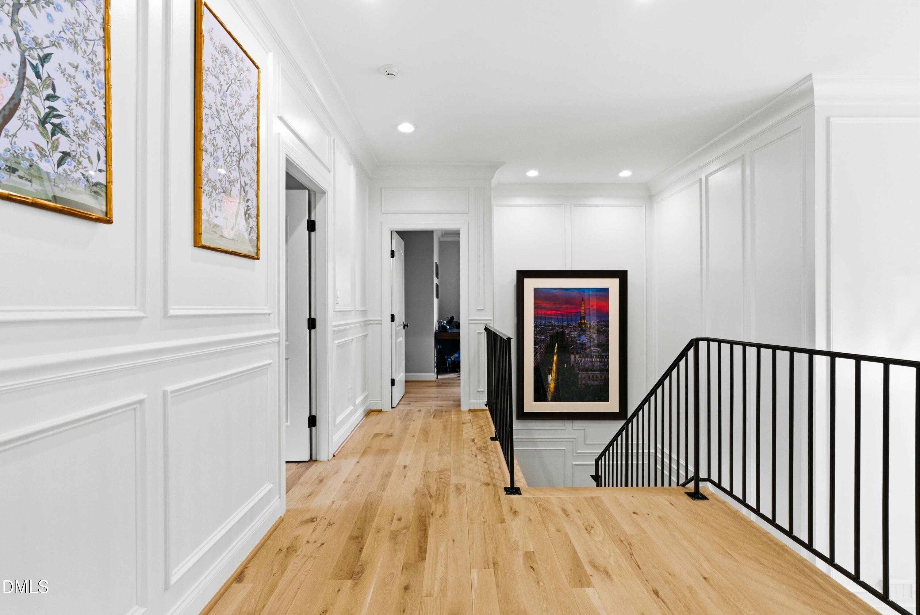 1528 Eglantyne Court Raleigh, NC 27613 - Photo 51 of 99 a view of a hallway with wooden floor and windows