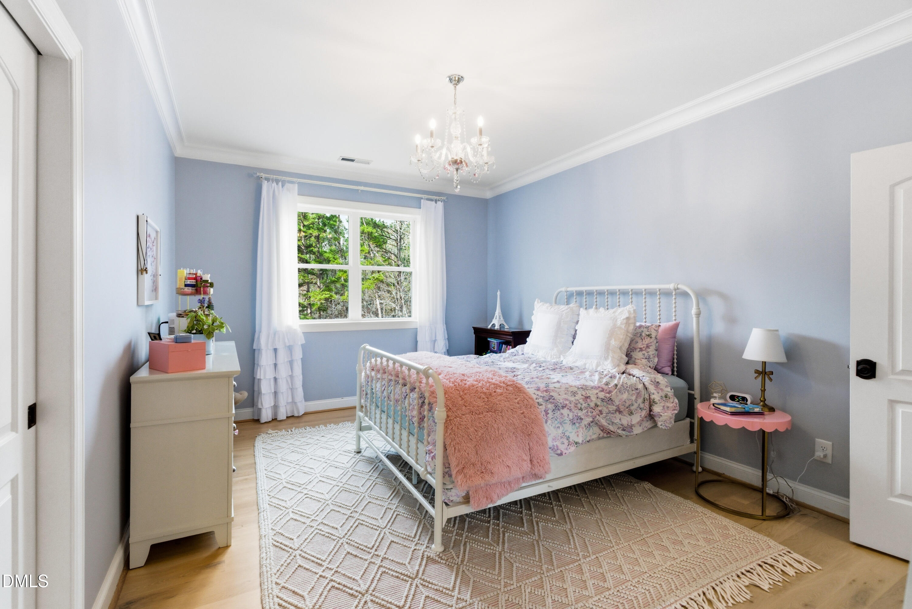 1528 Eglantyne Court Raleigh, NC 27613 - Photo 57 of 99 a bedroom with a bed and a window