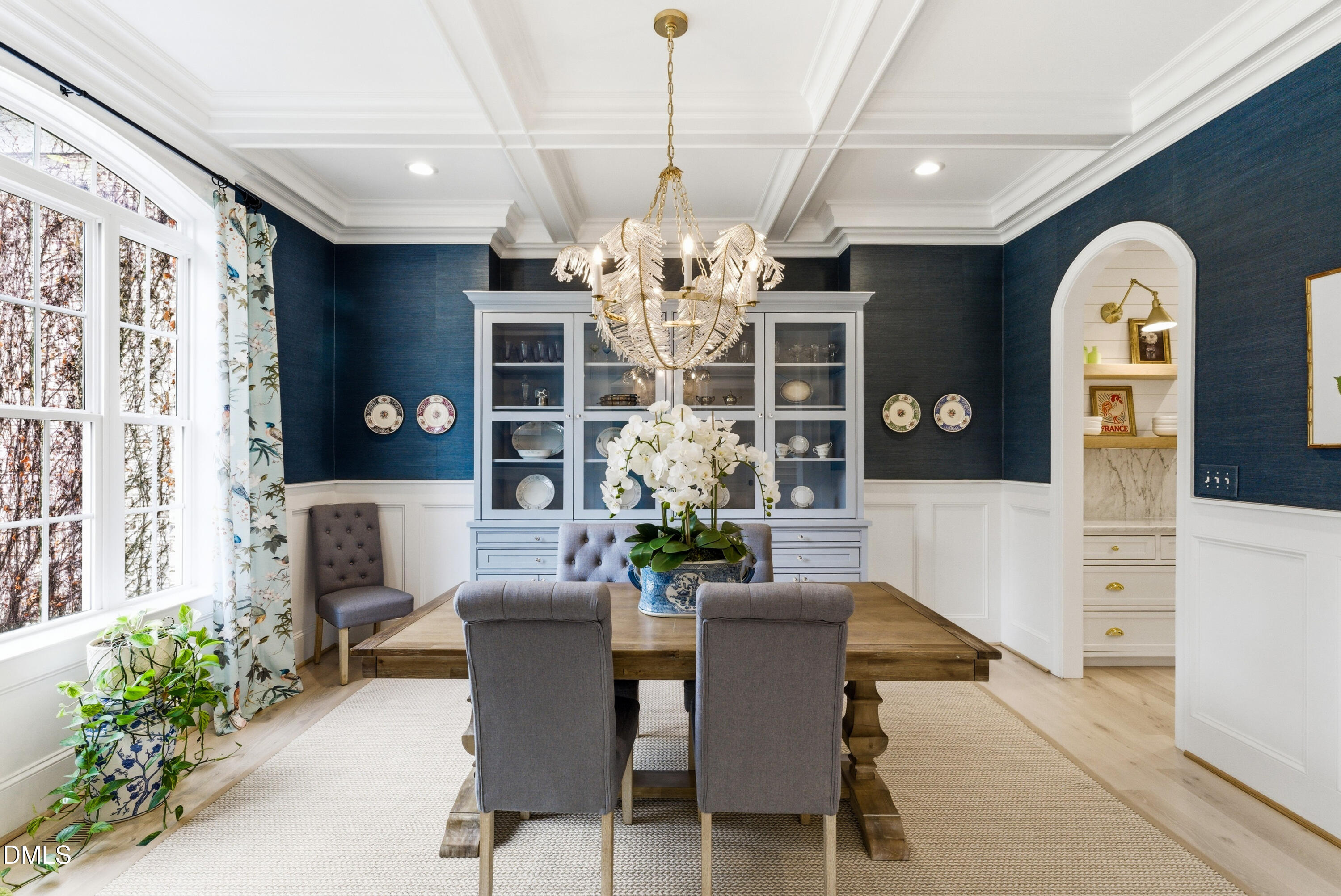1528 Eglantyne Court Raleigh, NC 27613 - Photo 6 of 99 a view of a dining room with furniture and chandelier