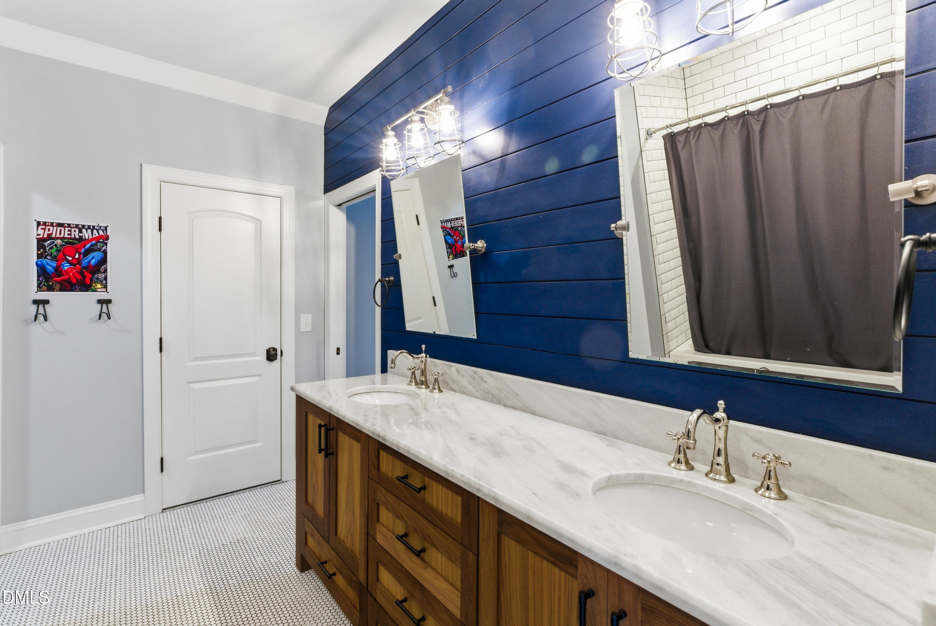 1528 Eglantyne Court Raleigh, NC 27613 - Photo 61 of 99 a bathroom with a double vanity sink and a mirror