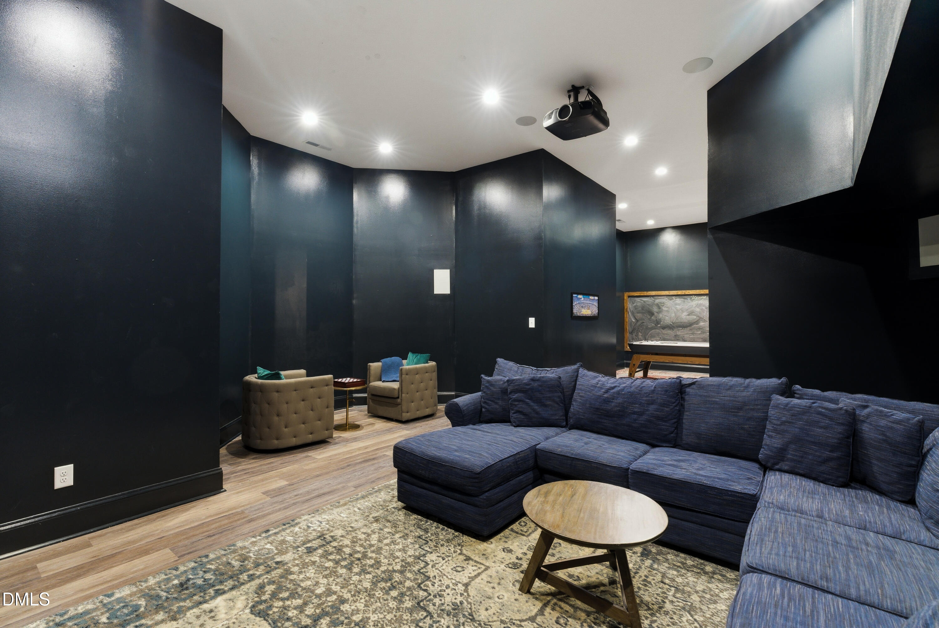 1528 Eglantyne Court Raleigh, NC 27613 - Photo 81 of 99 a living room with furniture and a rug