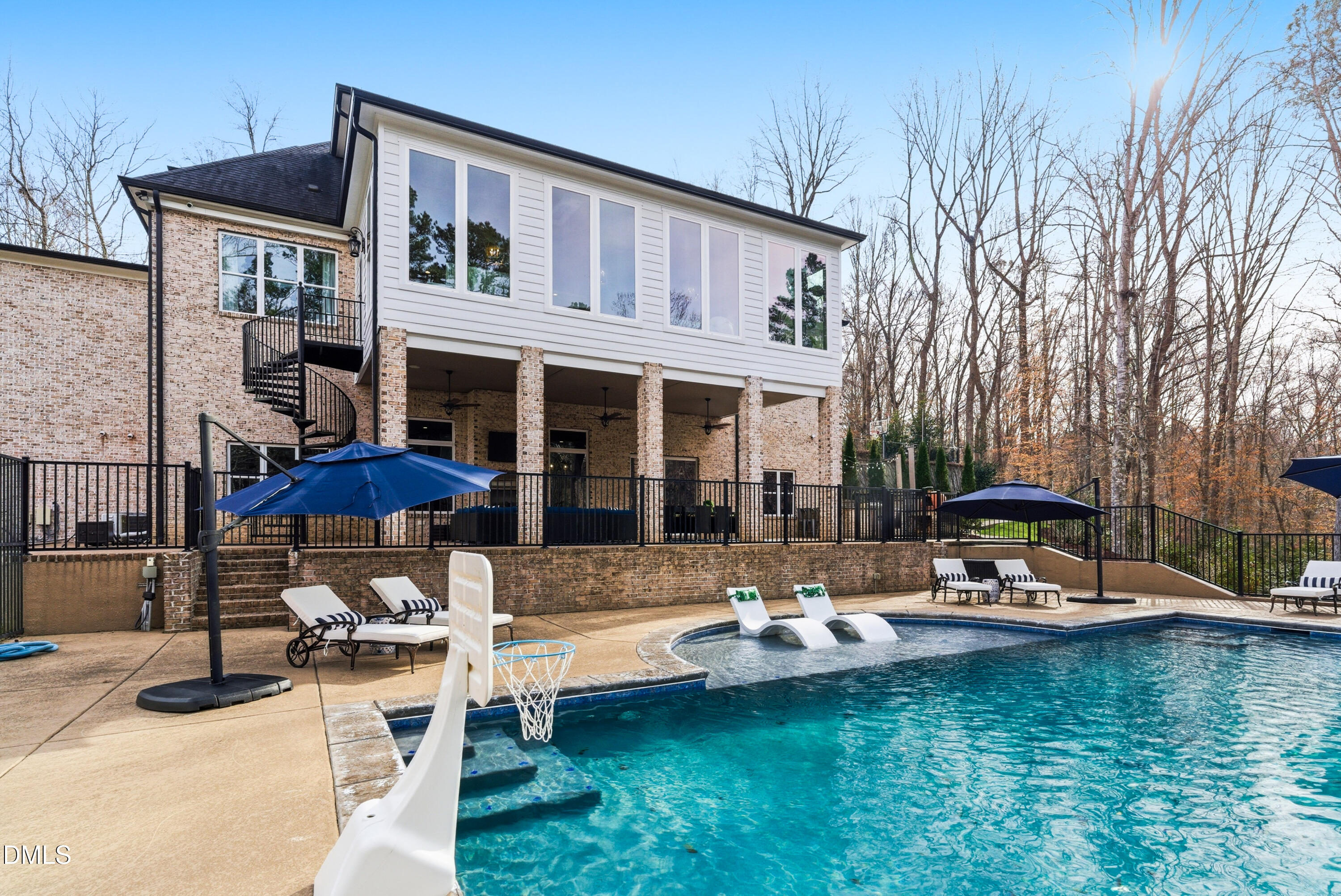 1528 Eglantyne Court Raleigh, NC 27613 - Photo 89 of 99 a view of a house with swimming pool and sitting area