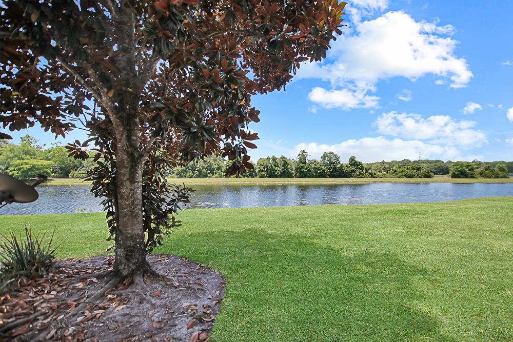 499 Cabernet Place St. Augustine, FL 32084 - Photo 13 of 30 a view of a lake with a yard