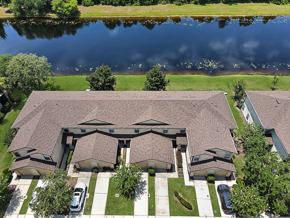 499 Cabernet Place St. Augustine, FL 32084 - Photo 19 of 30 an aerial view of a house with a yard and lake view