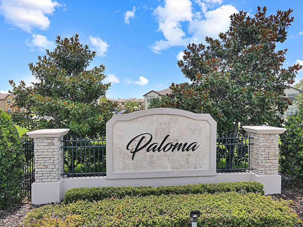 499 Cabernet Place St. Augustine, FL 32084 - Photo 21 of 30 a sign that is sitting in front of flowers