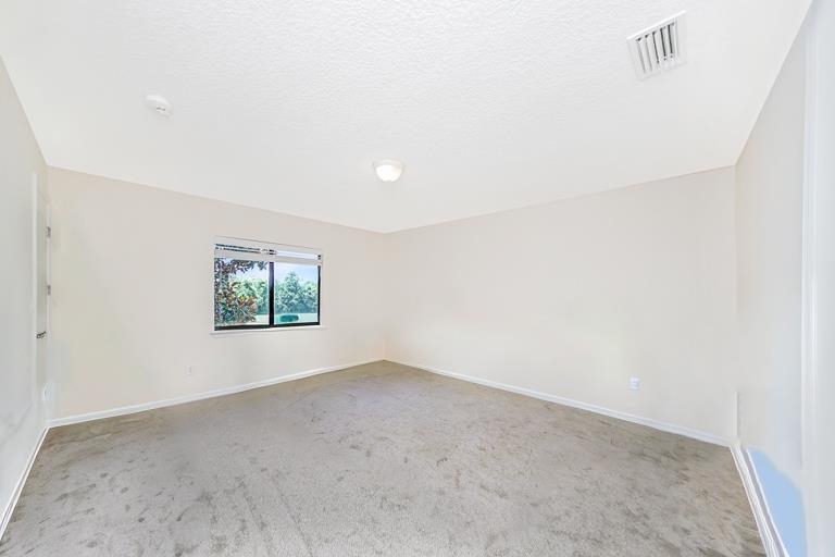 499 Cabernet Place St. Augustine, FL 32084 - Photo 30 of 30 an empty room with windows