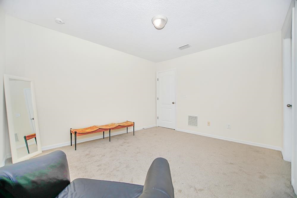 499 Cabernet Place St. Augustine, FL 32084 - Photo 9 of 30 a living room with furniture