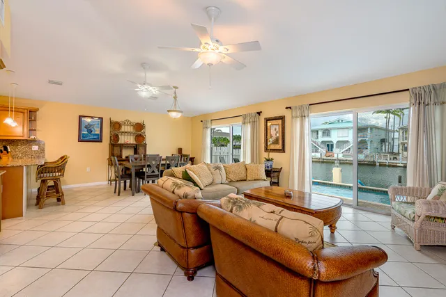 a view of a patio with a table and chairs