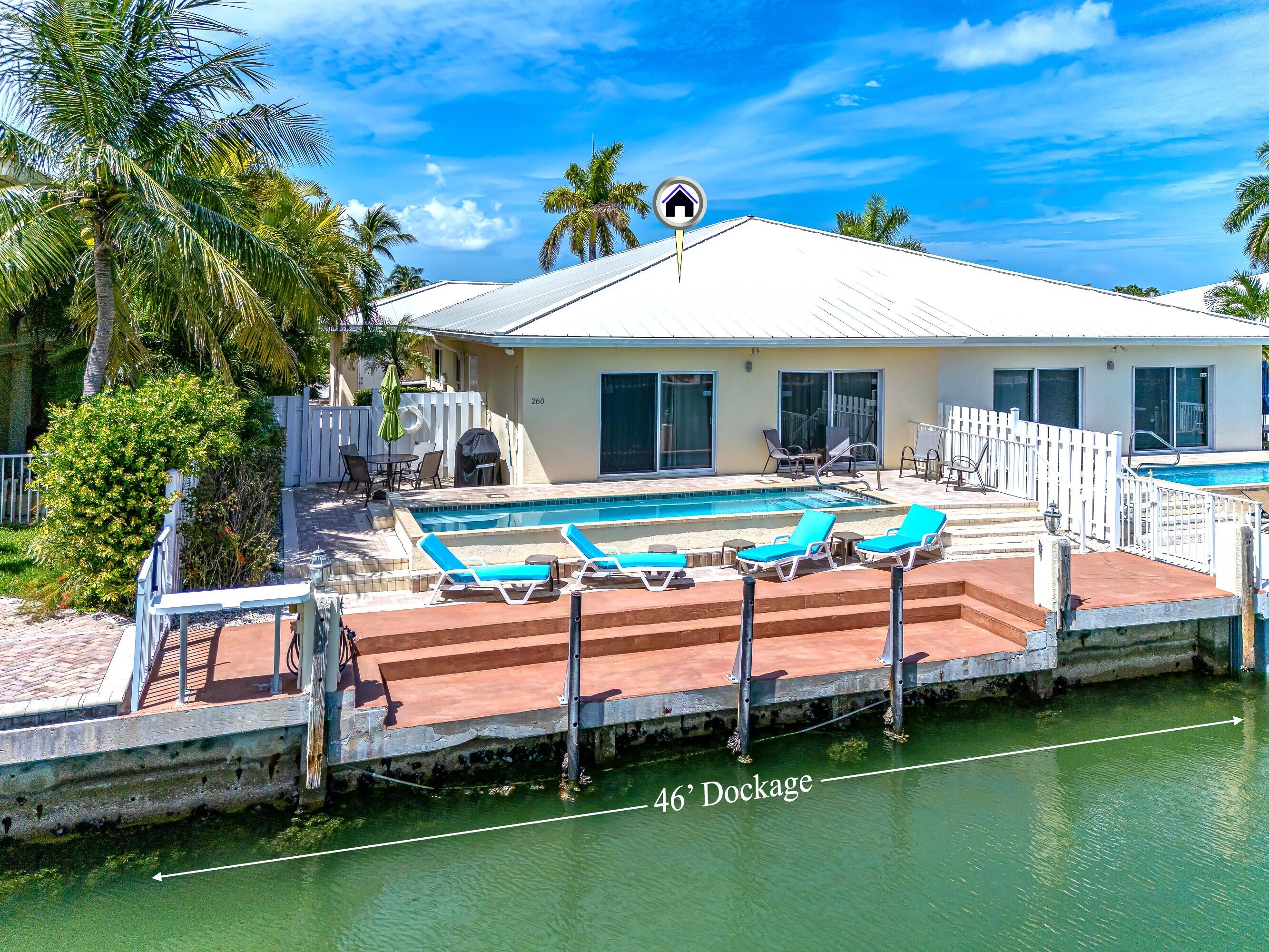 260 Sadowski Causeway Key Colony Beach, FL 33051 - Photo 28 of 50 a front view of a house with a patio